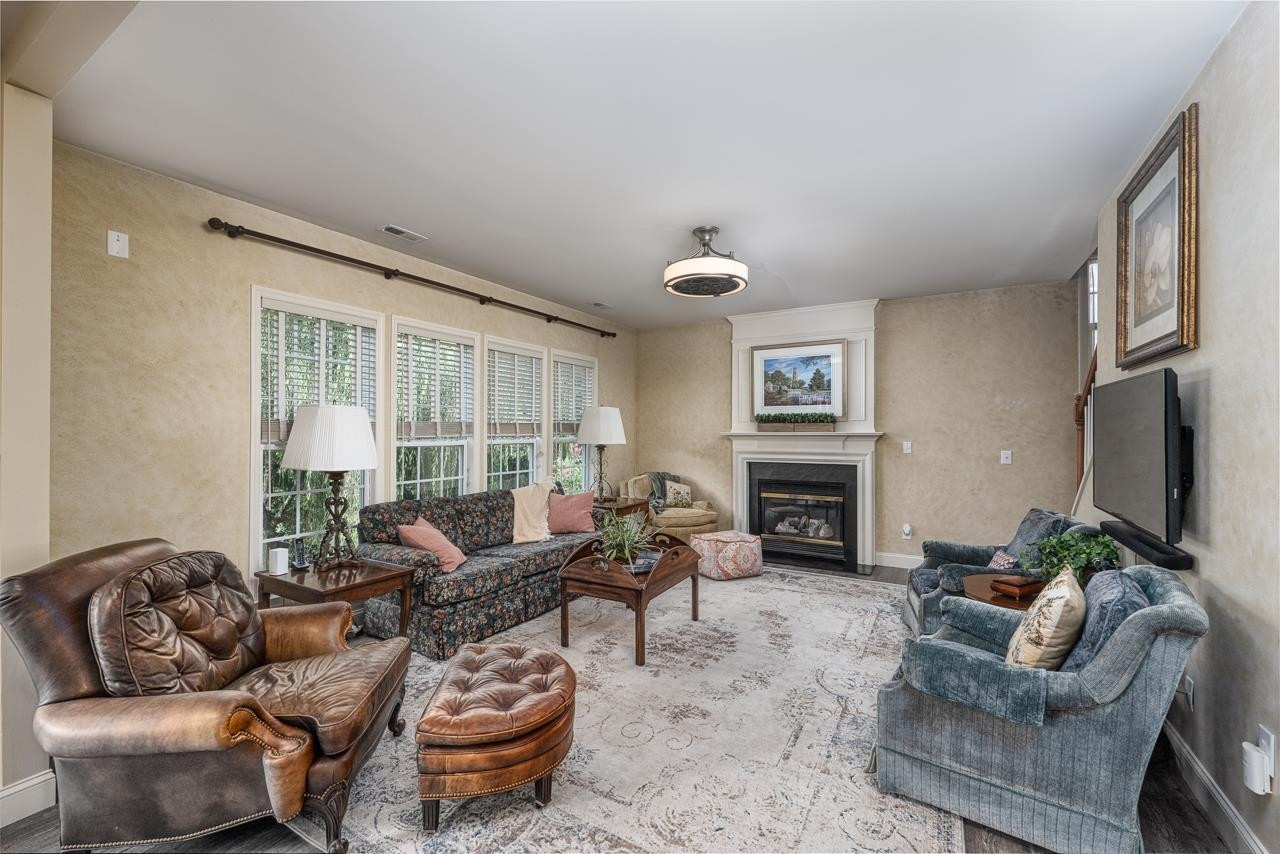 424 Willingham Road Morrisville, NC 27560 - Photo 10 of 30 Spacious Family Room with gas fireplace, views of the pretty backyard and open to the kitchen Family Room