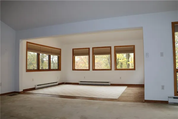 an empty room with windows