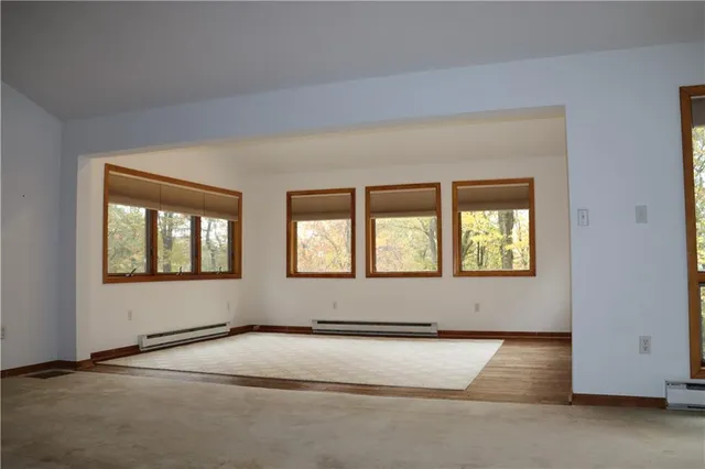 an empty room with windows