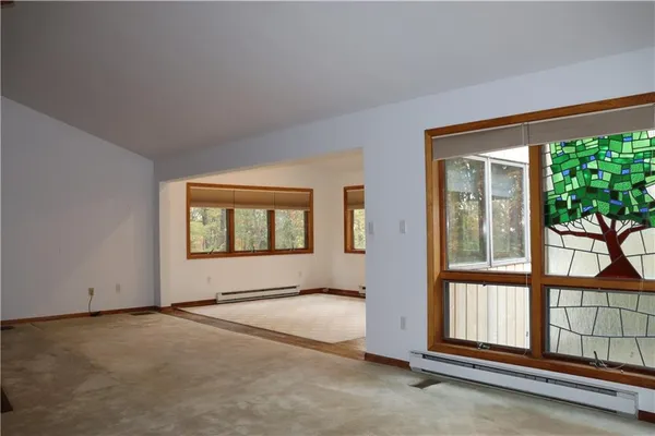 an empty room with windows