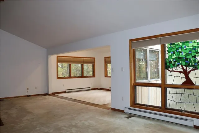 an empty room with windows