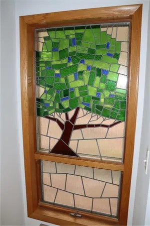 a view of a porch with a floor to ceiling window