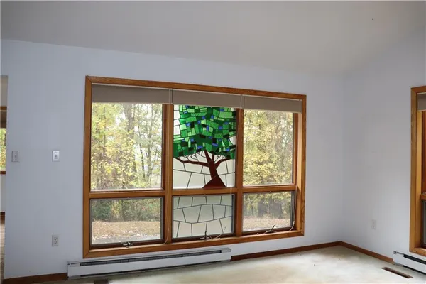 a view of a large window with an outdoor space