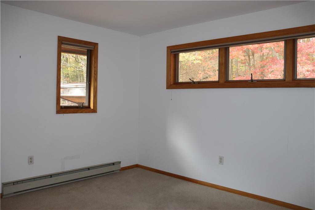 232 Red Arrow Road Ligonier, PA 15658 - Photo 26 of 47 an empty room with a window