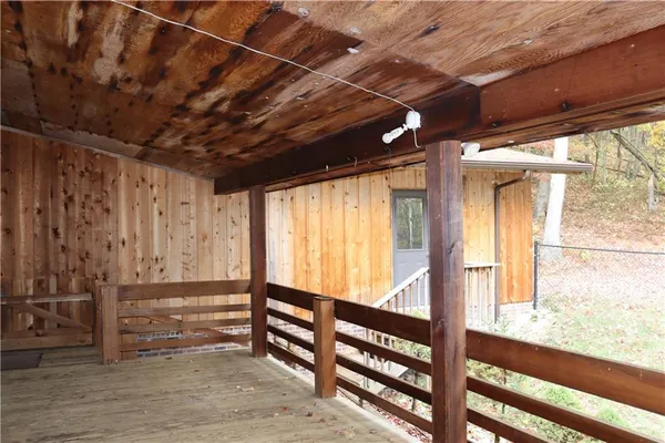a view of a large window with wooden floor
