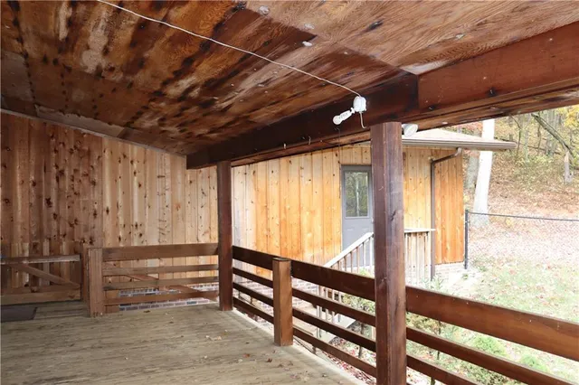 a view of a large window with wooden floor