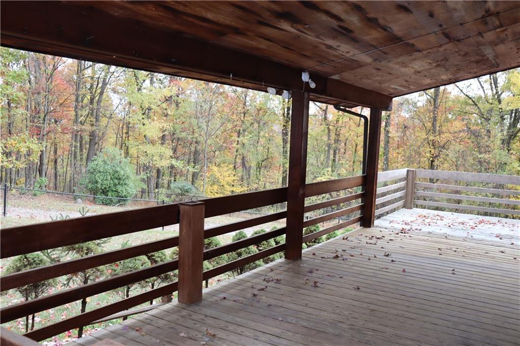 232 Red Arrow Road Ligonier, PA 15658 - Photo 47 of 47 a view of a wooden deck next to a yard