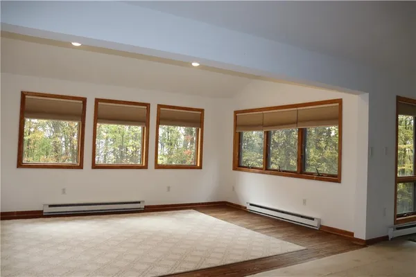 an empty room with windows