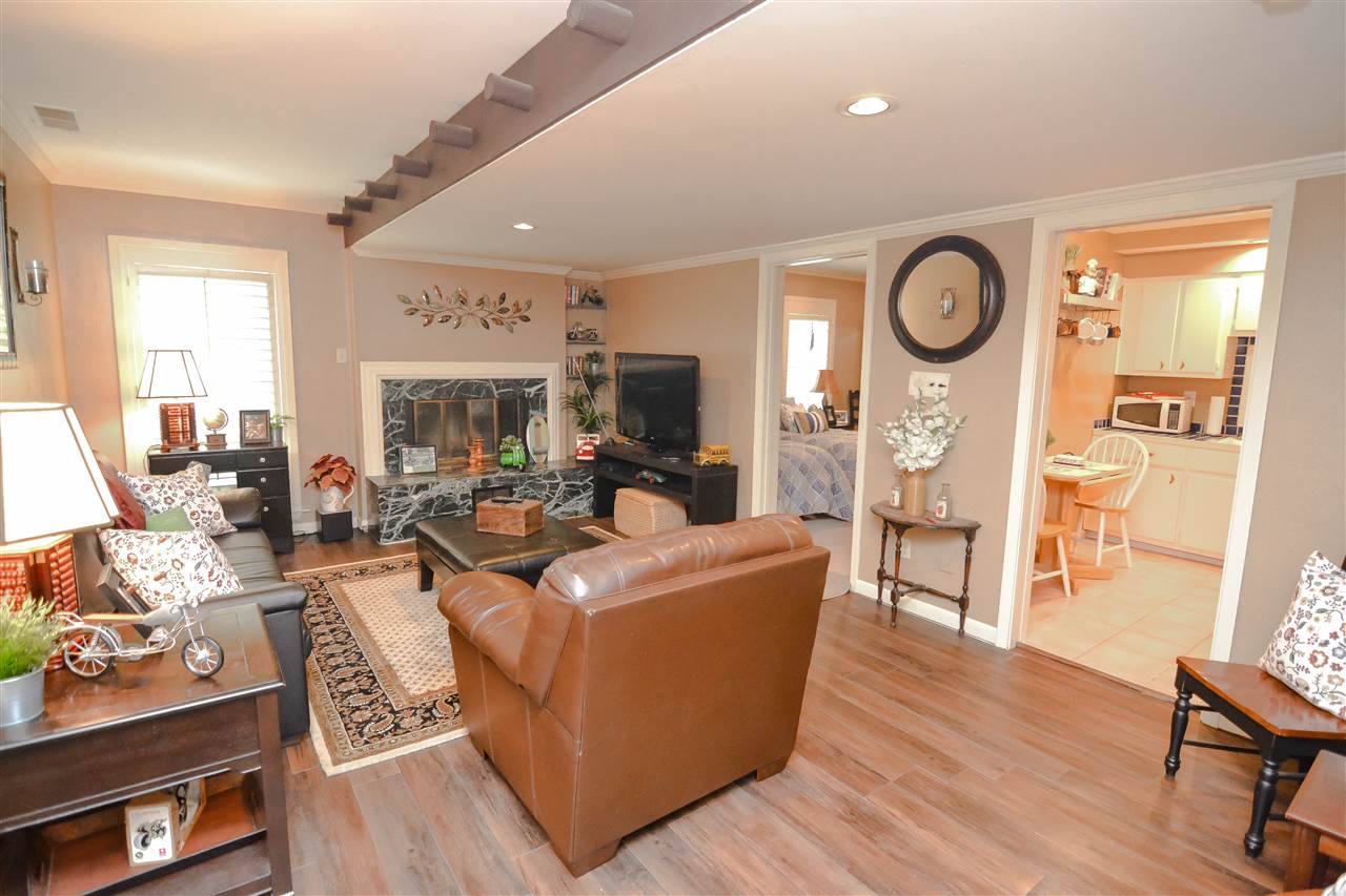 458 Rocky Point Road Cordova, TN 38018 - Photo 23 of 25 With fireplace & access to private screened patio & garage. Spiral staircase to Basement.
