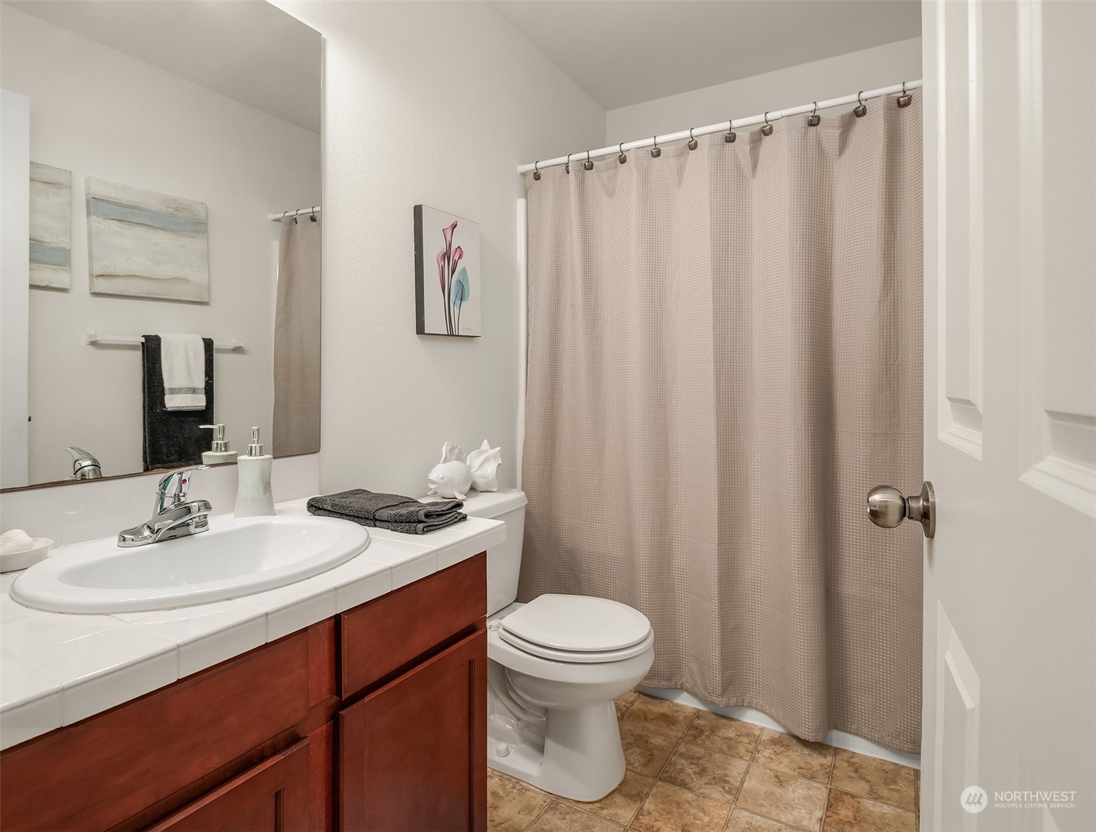 21621 11th Drive Southeast Bothell, WA 98021 - Photo 20 of 31 a bathroom with a granite countertop sink toilet and shower