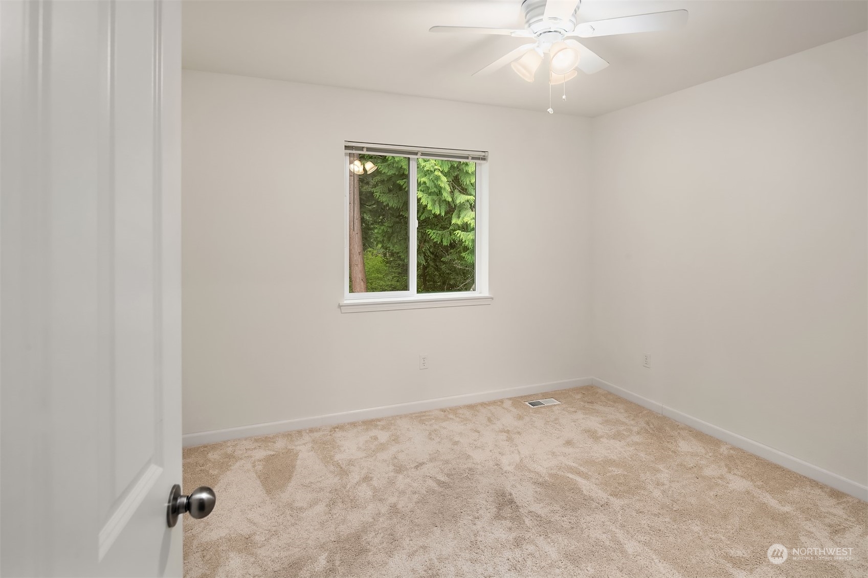 21621 11th Drive Southeast Bothell, WA 98021 - Photo 21 of 31 an empty room with a window