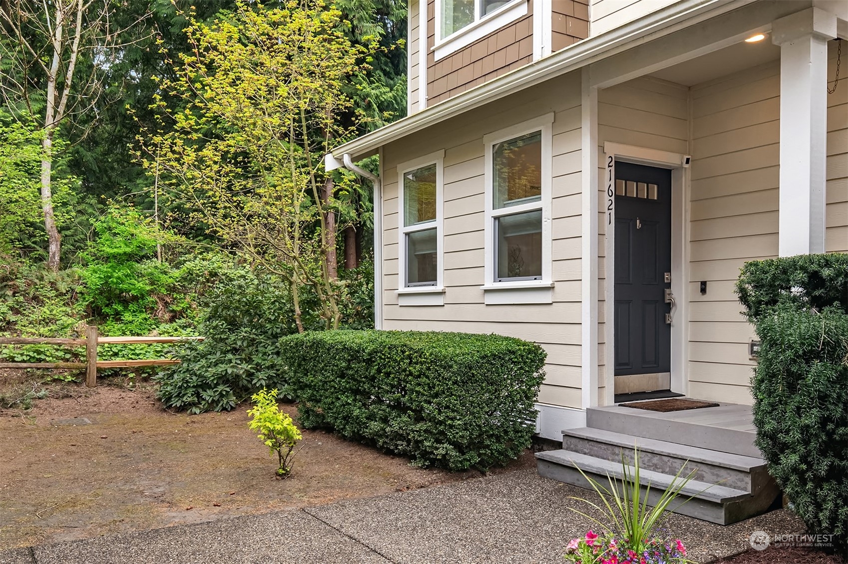 21621 11th Drive Southeast Bothell, WA 98021 - Photo 31 of 31 a front view of a house with garden