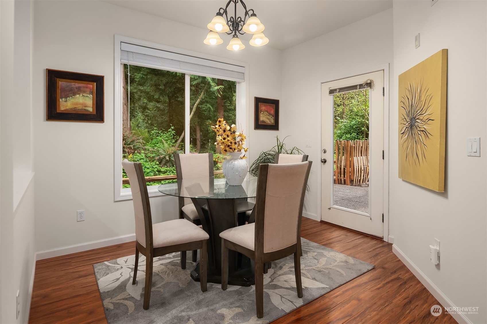 21621 11th Drive Southeast Bothell, WA 98021 - Photo 8 of 31 a view of a dining room with furniture window and wooden floor