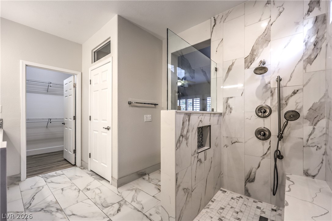 2072 Crown View Street Henderson, NV 89052 - Photo 25 of 53 Remodeled Bathroom with W/I Shower, Raised Vanity w/ Quartz Countertop, Dual Sinks, and Tile Flooring