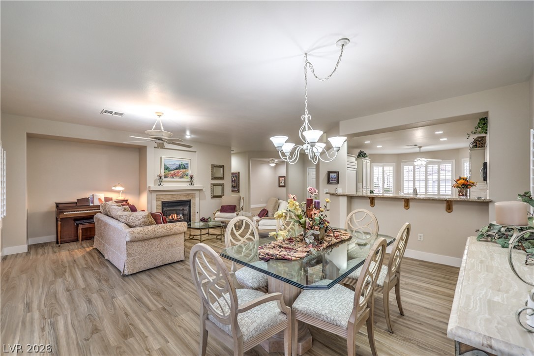 2072 Crown View Street Henderson, NV 89052 - Photo 8 of 53 Formal Dining Area with Laminate Wood Flooring