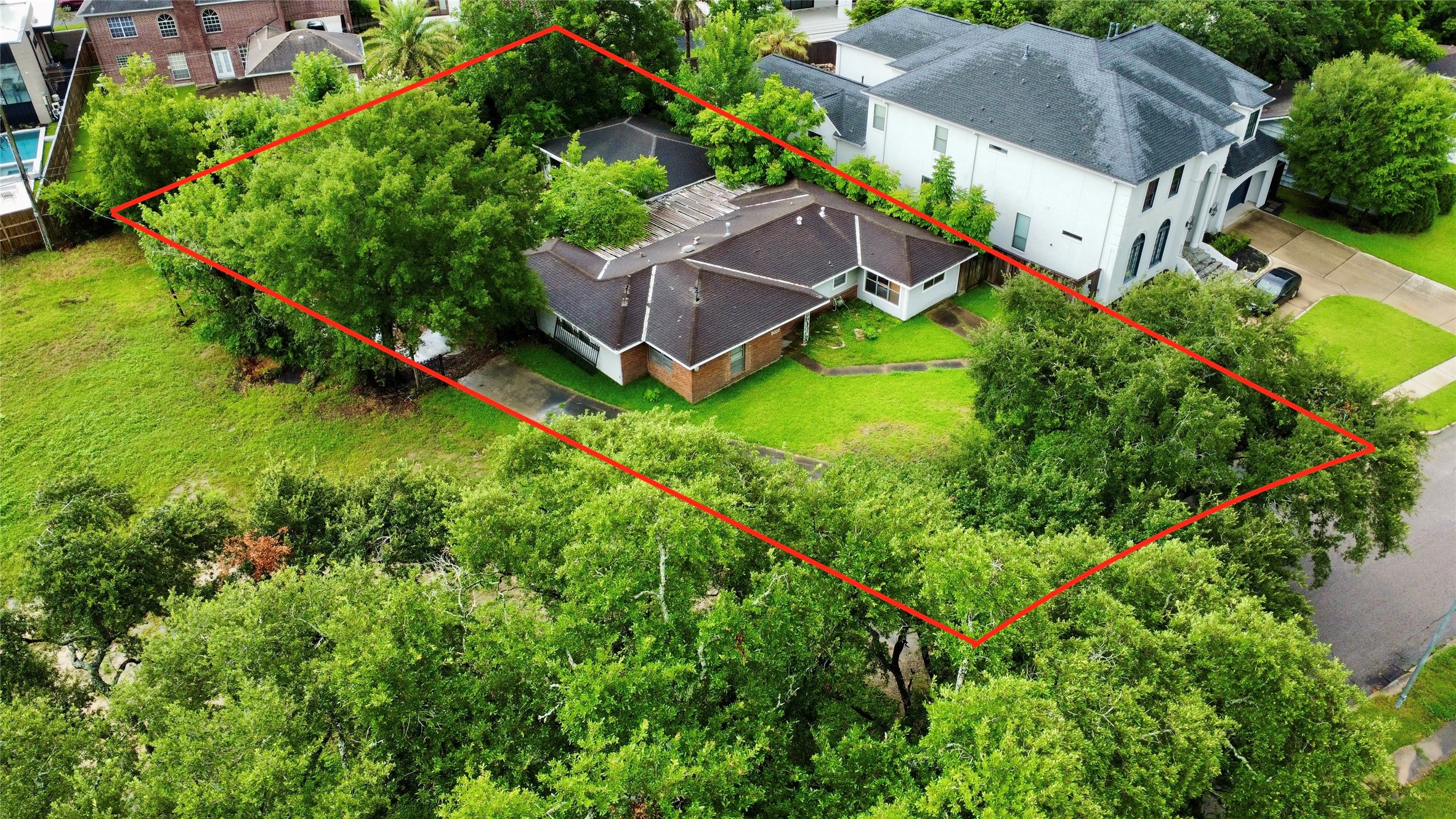 5027 Grape Street Houston, TX 77096 - Photo 2 of 5 Property boundary lines are approximate and need to be verified. Old home is already being demoed.