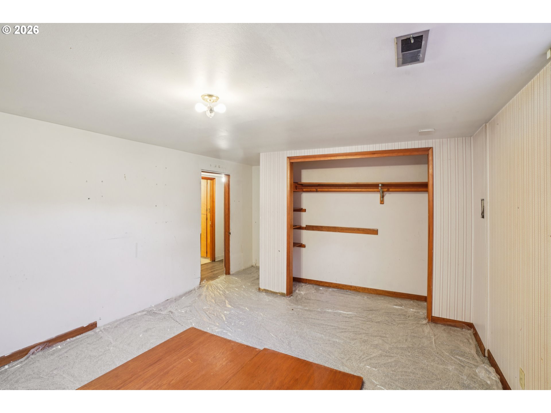 2530 Southeast 190th Avenue Gresham, OR 97030 - Photo 27 of 35 an empty room with closet and cabinet