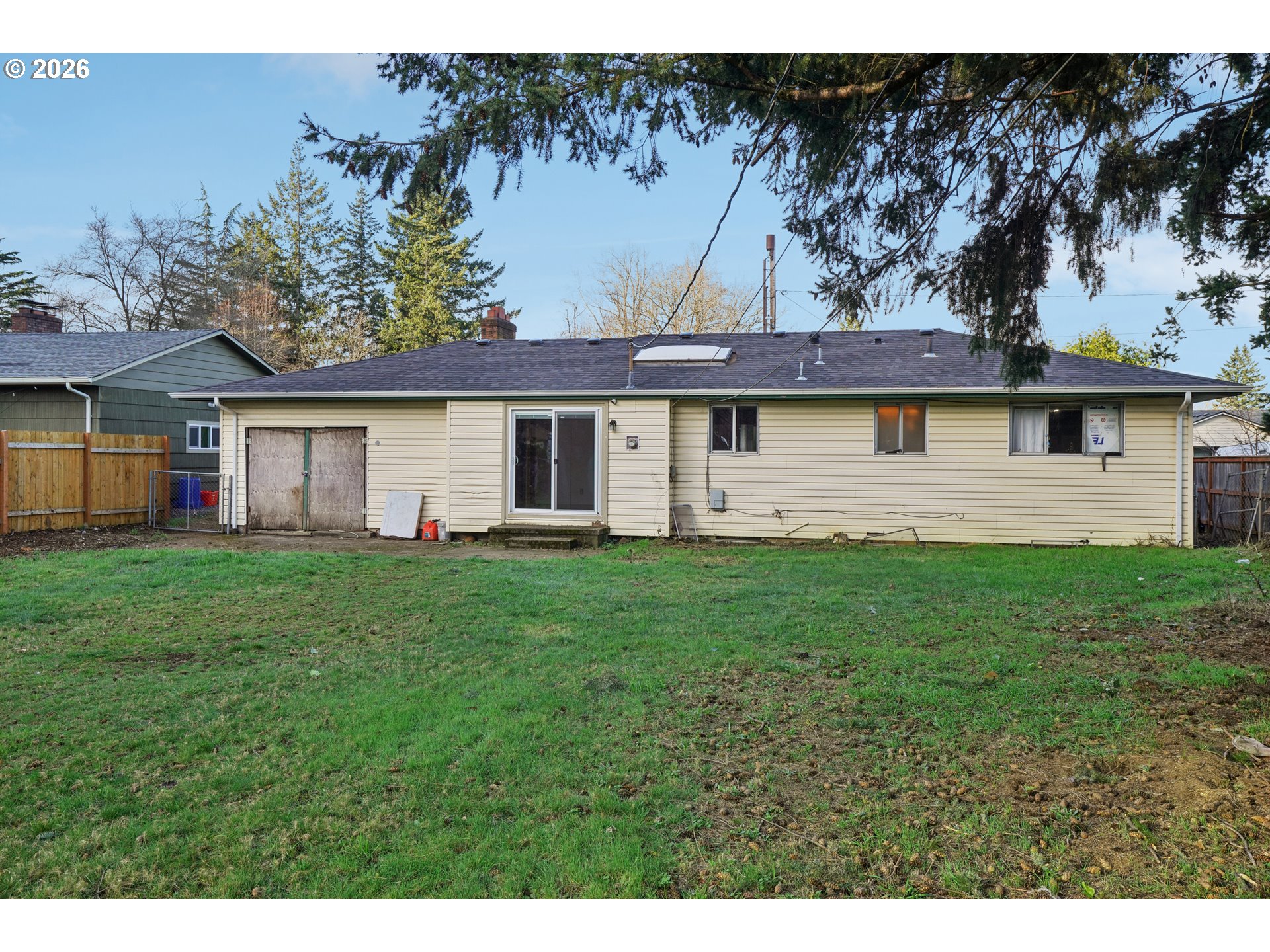 2530 Southeast 190th Avenue Gresham, OR 97030 - Photo 34 of 35 a view of a yard in front of a house with large tree