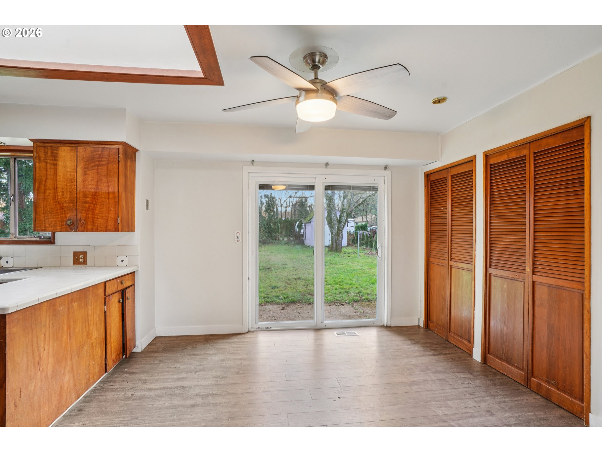 2530 Southeast 190th Avenue Gresham, OR 97030 - Photo 9 of 35 a view interior of a house wooden floor and a ceiling fan
