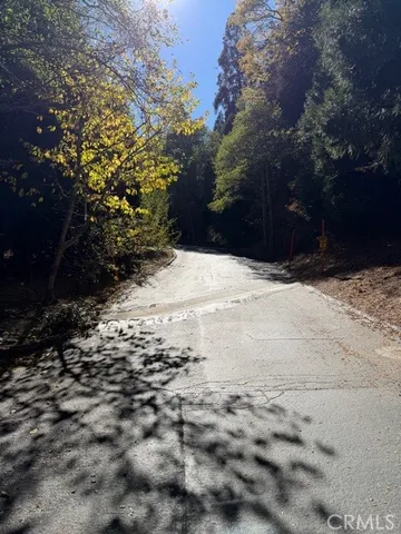 a view of snow on the side of the road