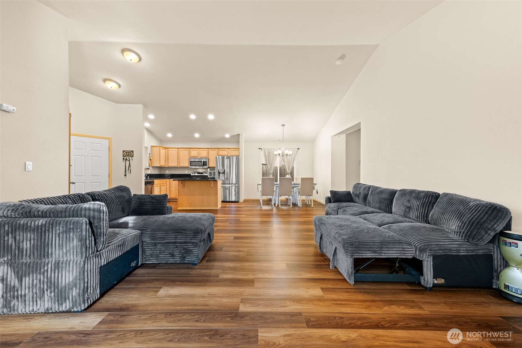 20009 96th Avenue East Graham, WA 98338 - Photo 13 of 40 a living room with furniture and a wooden floor