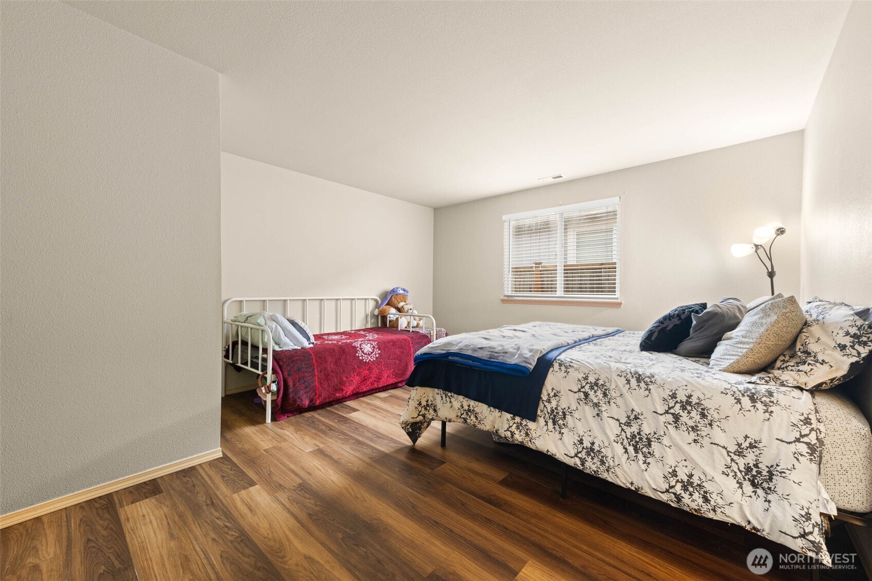 20009 96th Avenue East Graham, WA 98338 - Photo 14 of 40 a bedroom with a bed and window