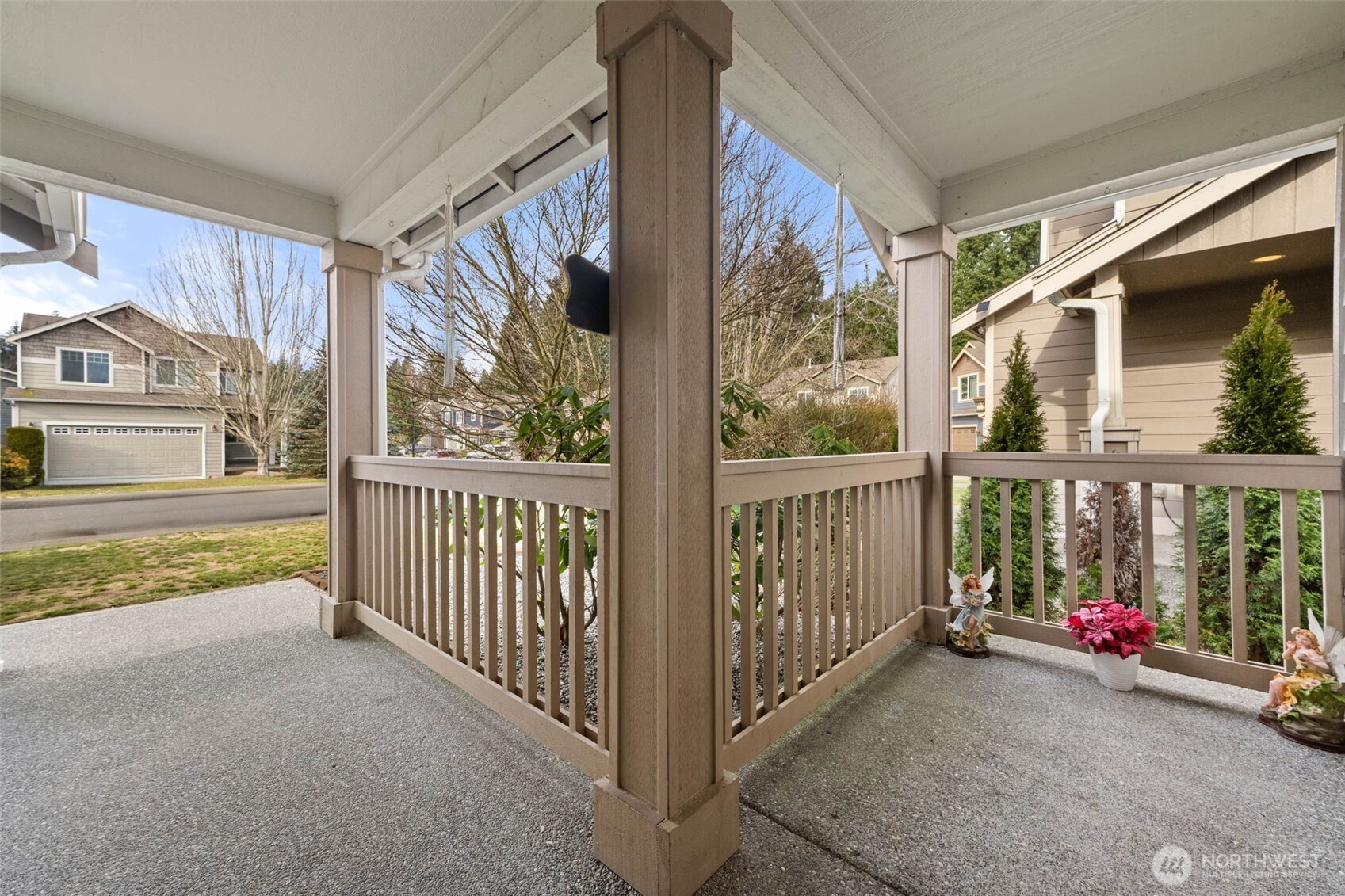 20009 96th Avenue East Graham, WA 98338 - Photo 32 of 40 a view of a porch with wooden floor and iron fence
