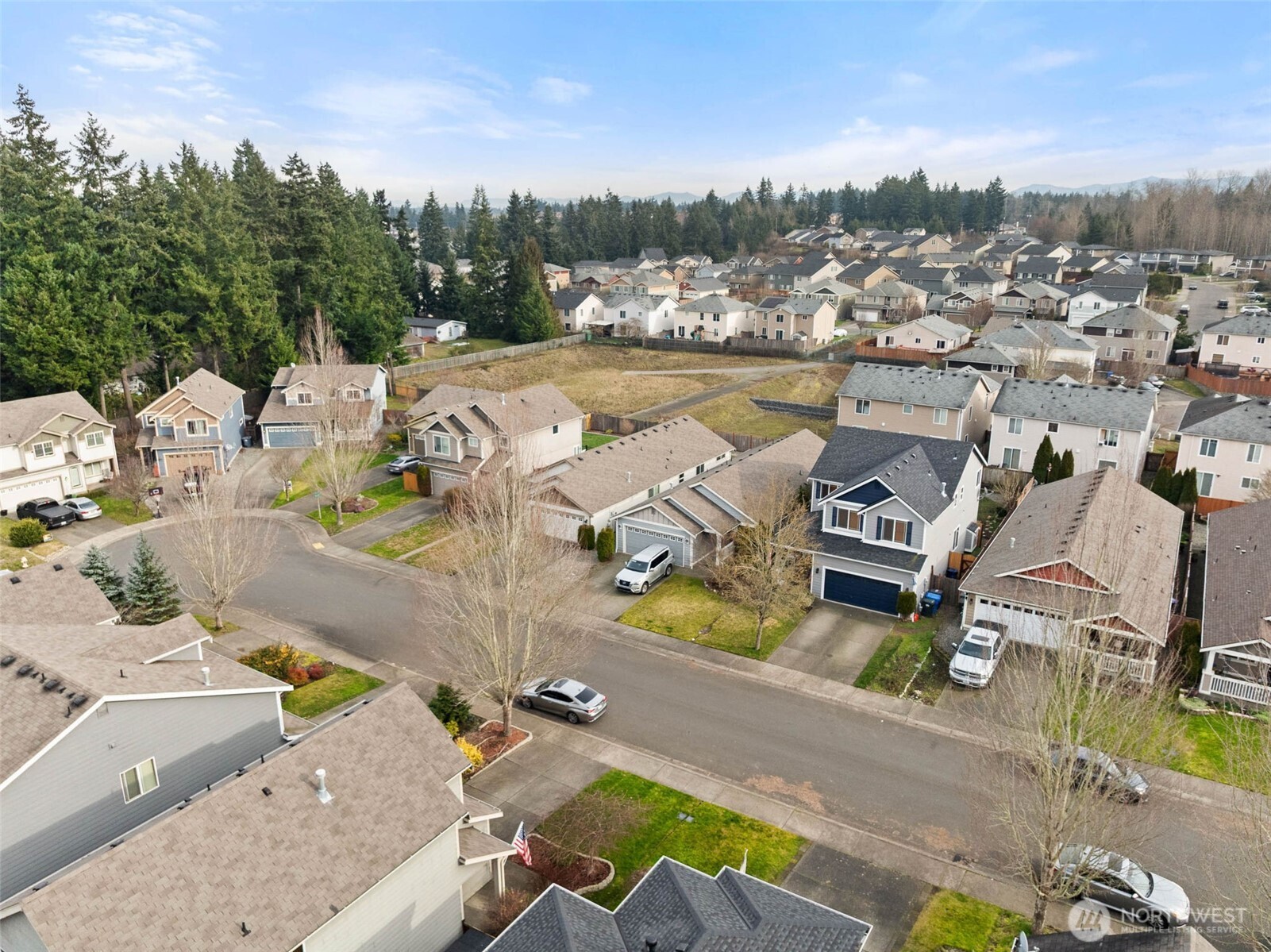 20009 96th Avenue East Graham, WA 98338 - Photo 35 of 40 an aerial view of a swimming pool with outdoor seating