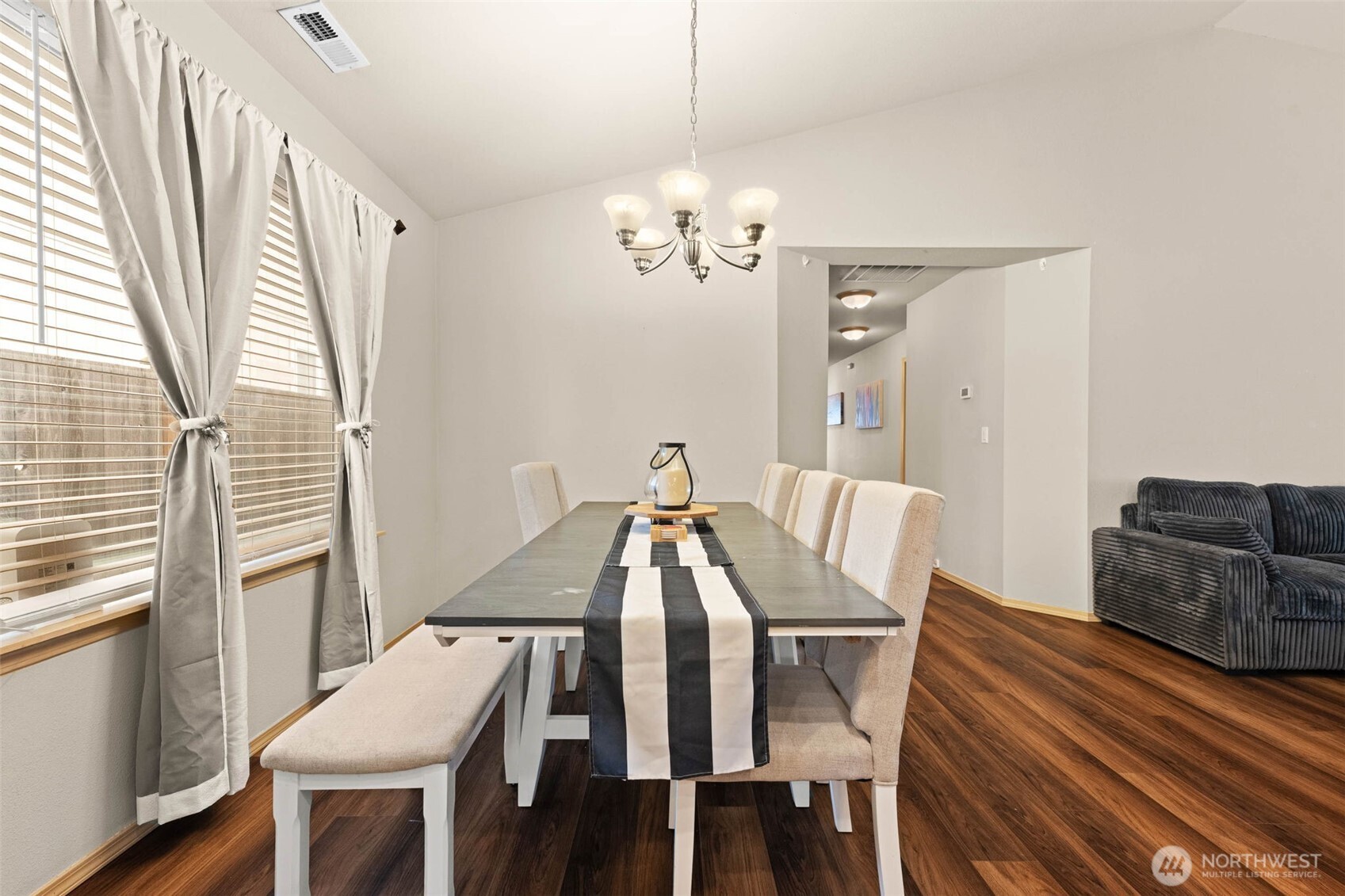 20009 96th Avenue East Graham, WA 98338 - Photo 10 of 40 a view of a dining room with furniture window and wooden floor