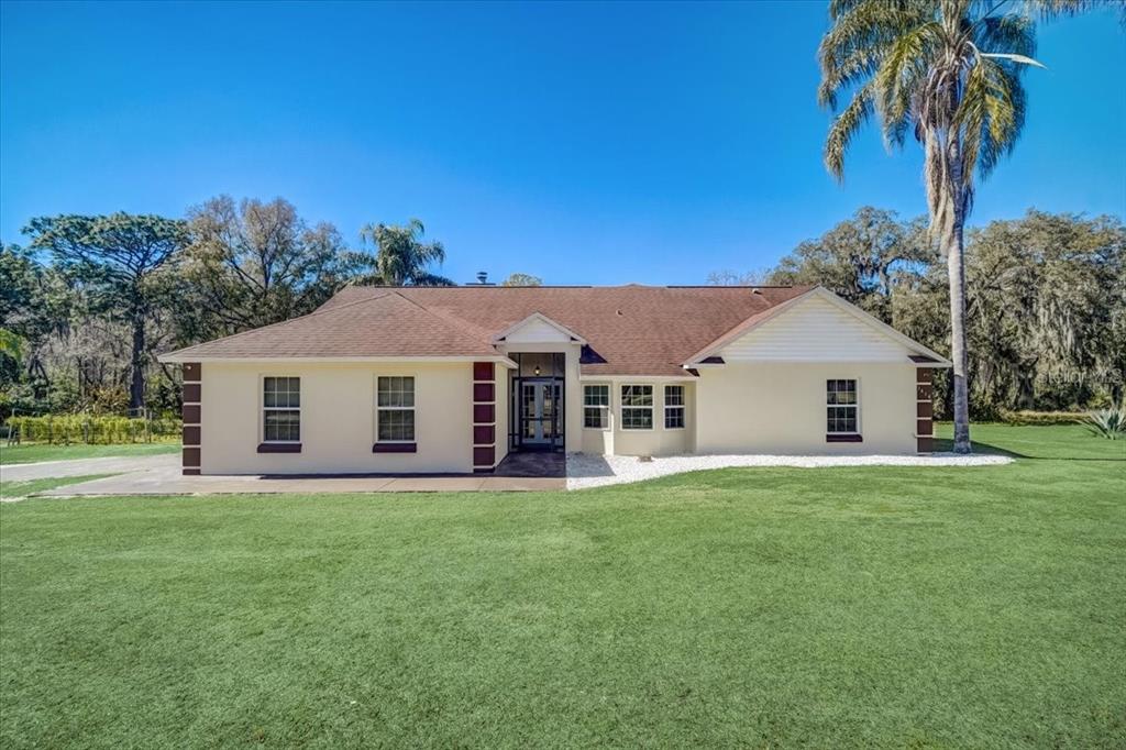 1414 Morrison Road Leesburg, FL 34748 - Photo 1 of 1 Welcome to 1414 Morrison Road. 3.071 Acres of private. Your own Compound.