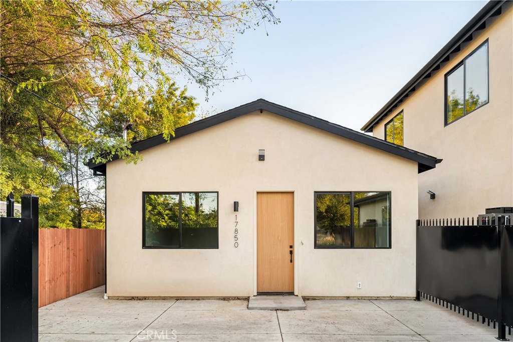 17852 Saticoy Street Reseda, CA 91335 - Photo 17 of 28 a front view of a house with garage