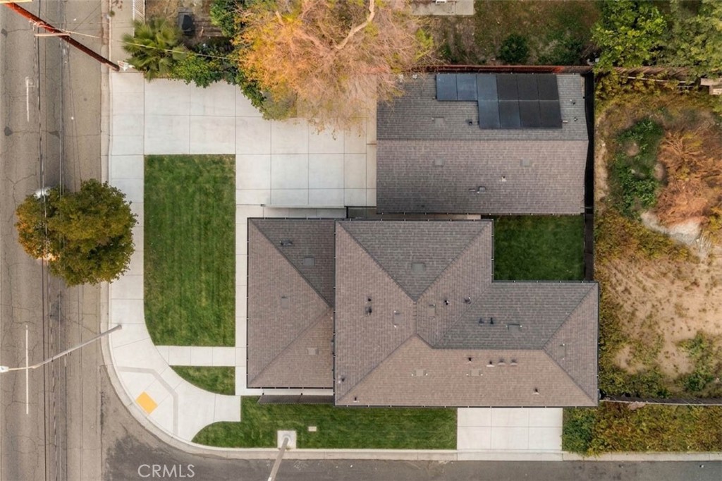 17852 Saticoy Street Reseda, CA 91335 - Photo 27 of 28 an aerial view of a house with a yard