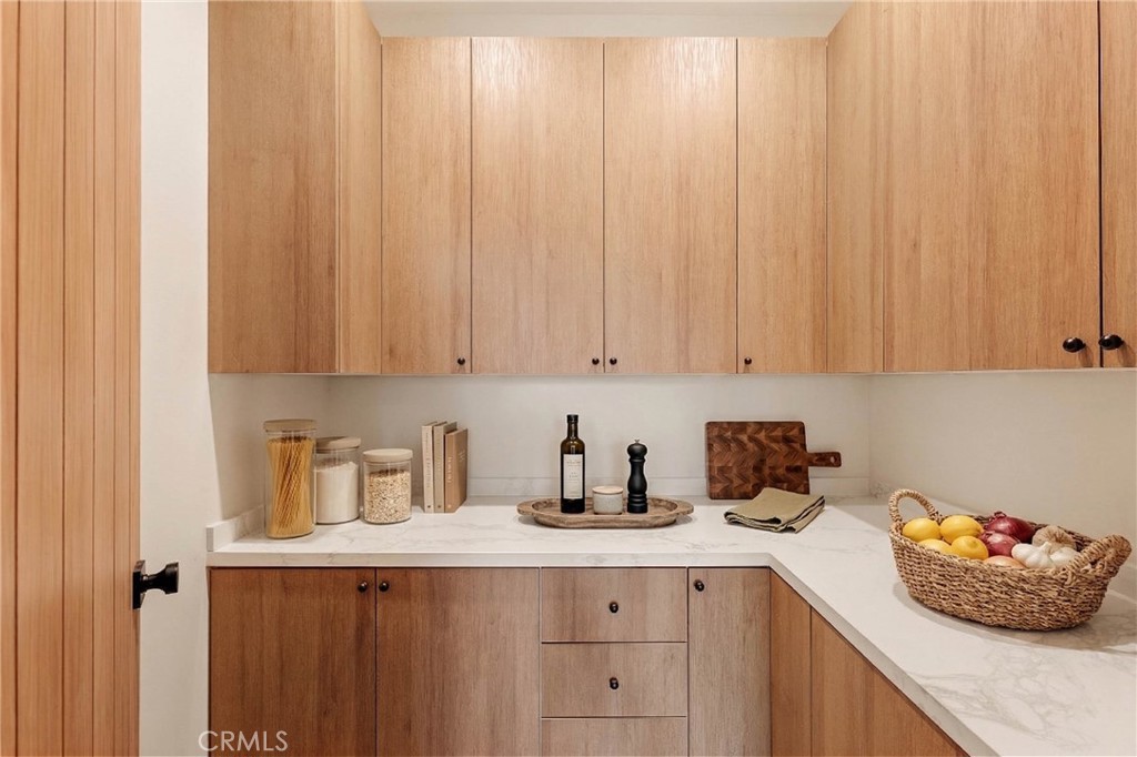 17852 Saticoy Street Reseda, CA 91335 - Photo 7 of 28 a kitchen with a sink cabinets and window