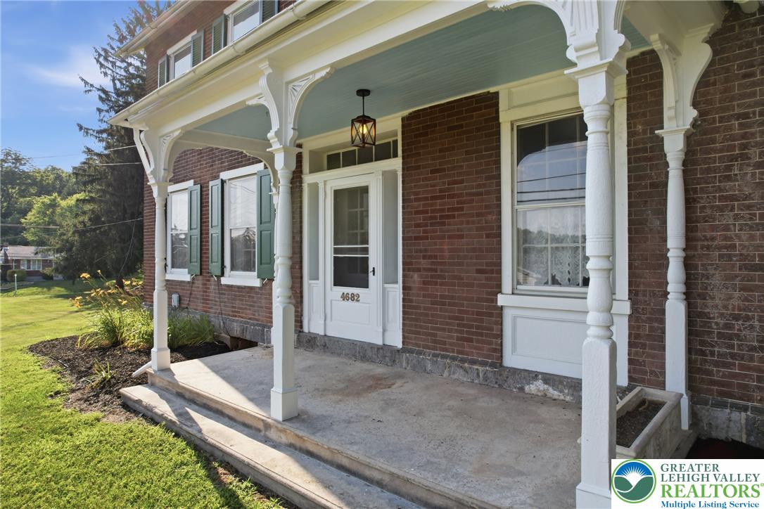 4682 Steuben Road Bethlehem, PA 18020 - Photo 78 of 79 A charming brick exterior with a welcoming covered porch awaits, offering classic curb appeal.