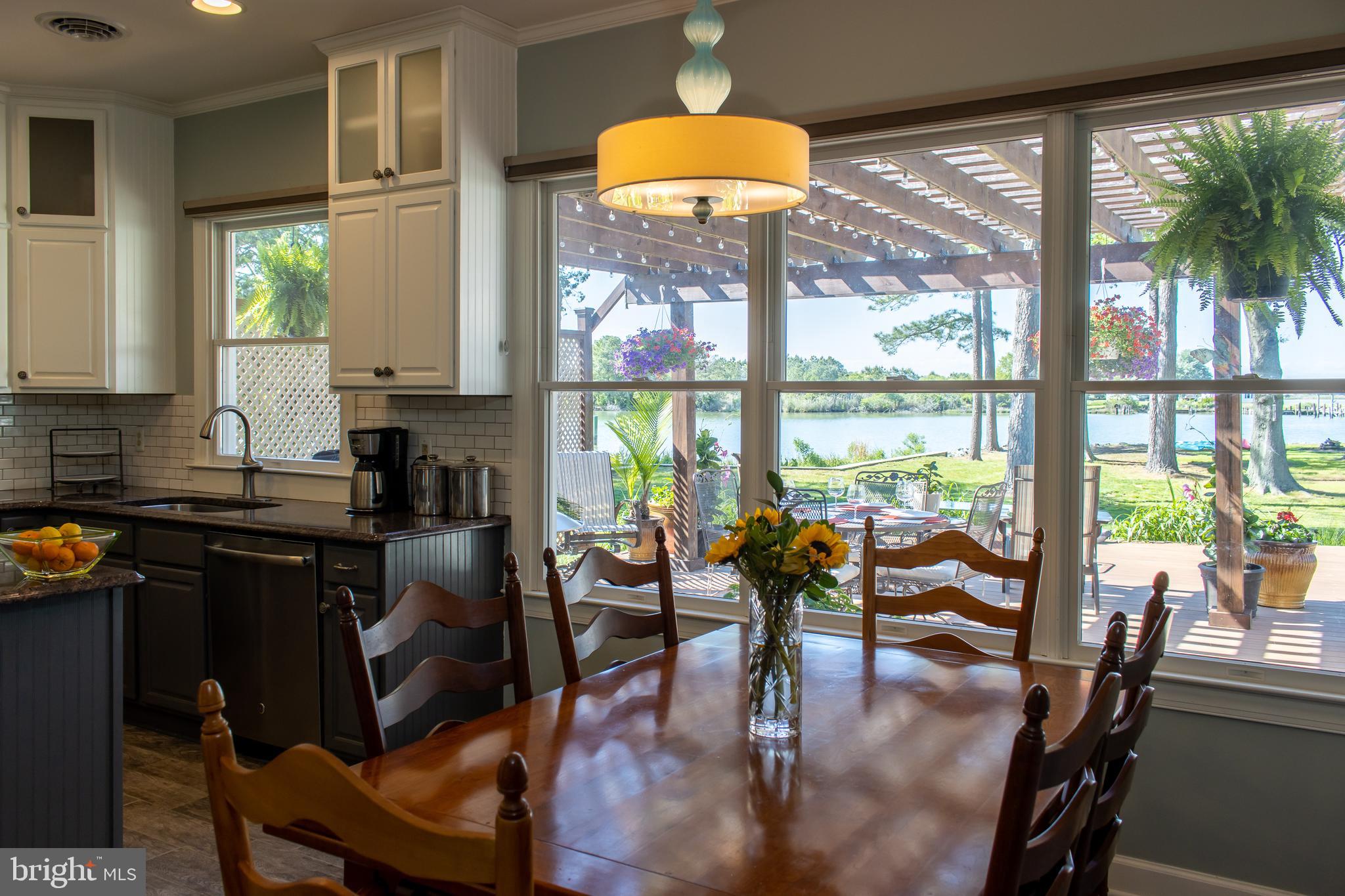 1020 River Point Road Cambridge, MD 21613 - Photo 15 of 45 Dining Area off kitchen w/ incredible water views