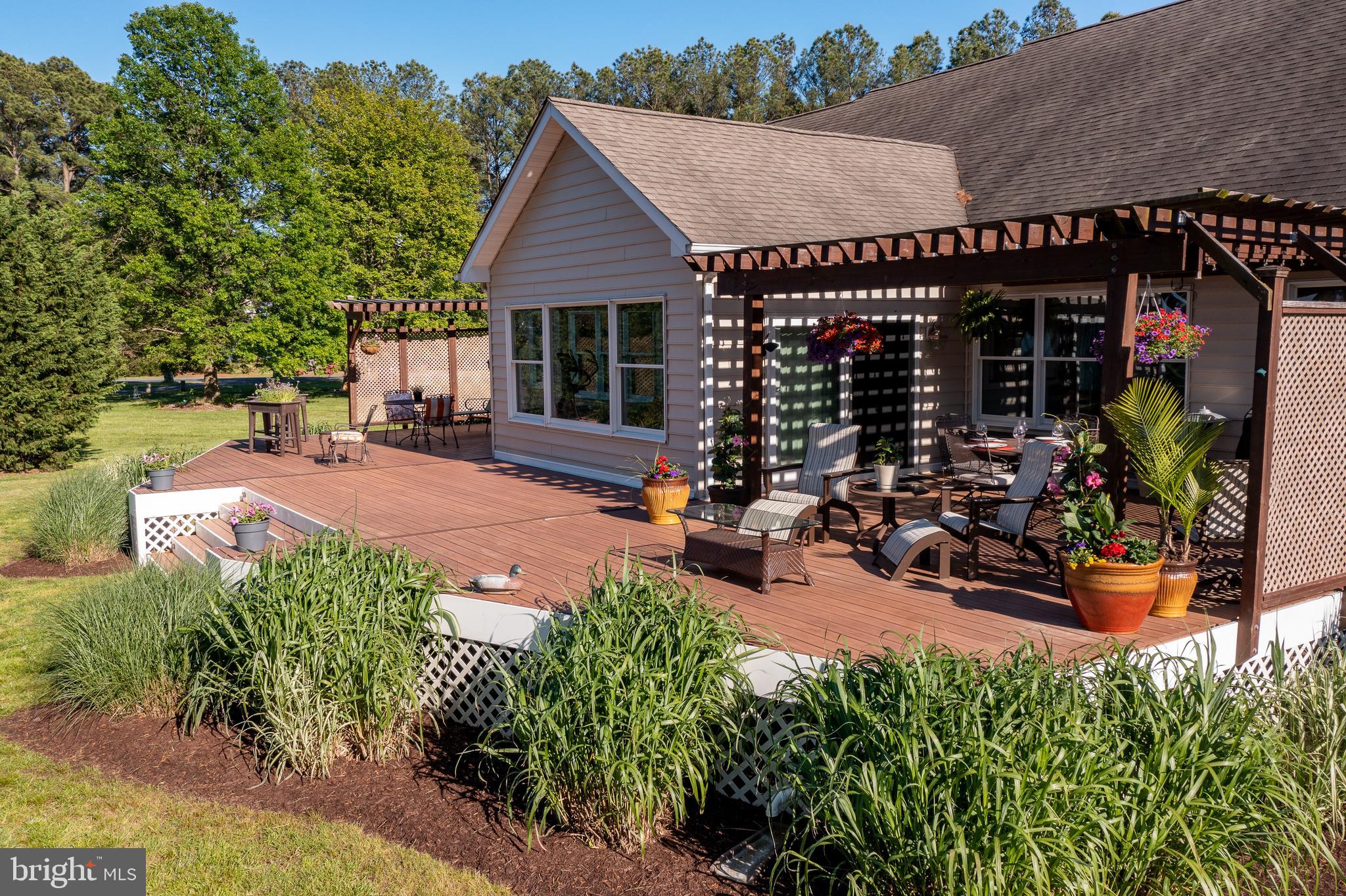 1020 River Point Road Cambridge, MD 21613 - Photo 3 of 45 Low Maintenance Waterside Deck with pergola
