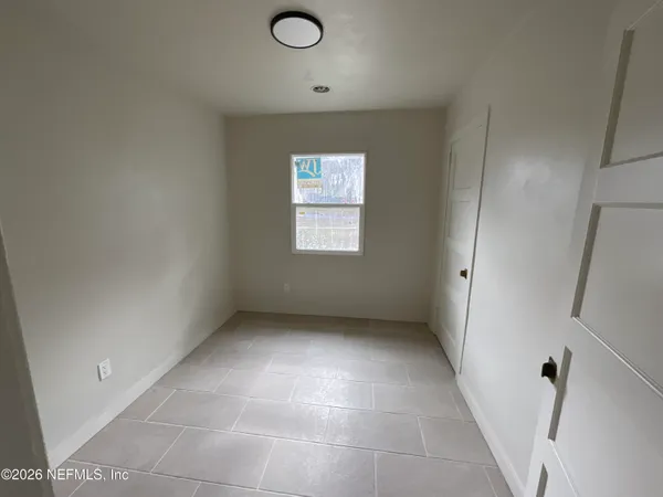 an empty room with windows