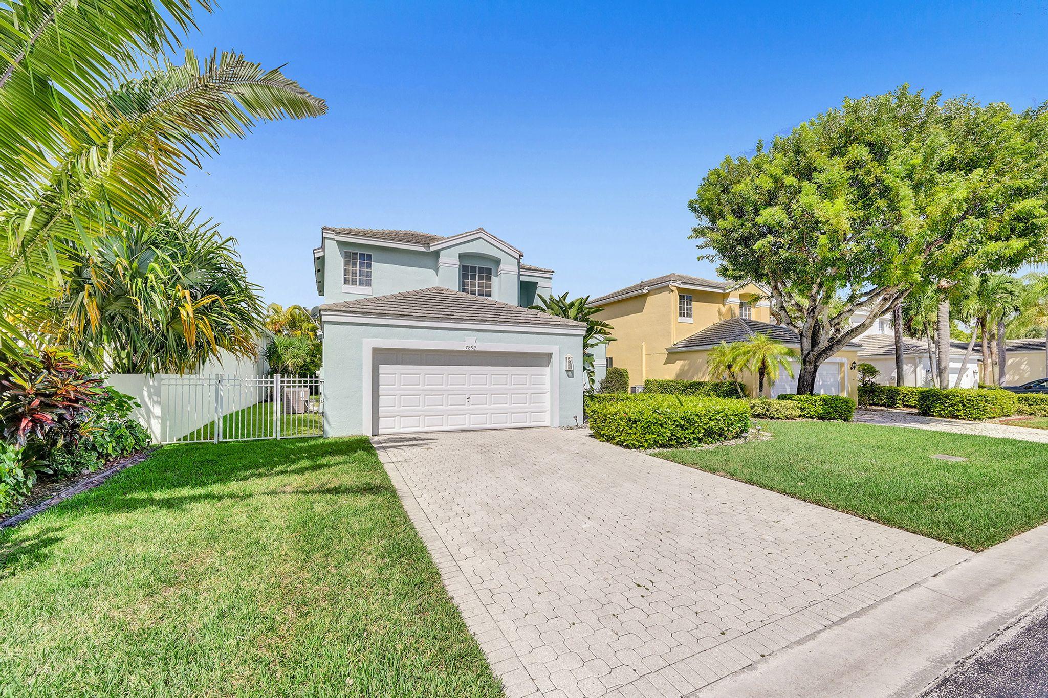 7892 Travelers Tree Drive Boca Raton, FL 33433 - Photo 3 of 42 Front of Home