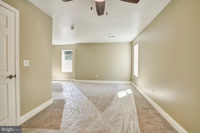 a bathroom with a shower and a toilet