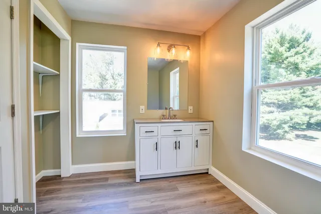 a view of an empty room and window