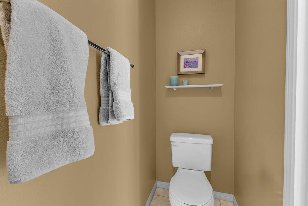 29 Calle La Reina Rancho Mirage, CA 92270 - Photo 31 of 49 a white toilet sitting next to a white wall