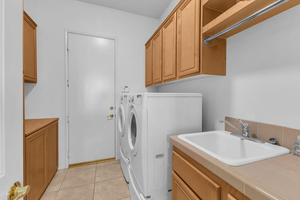29 Calle La Reina Rancho Mirage, CA 92270 - Photo 36 of 49 a bathroom with a sink and a toilet