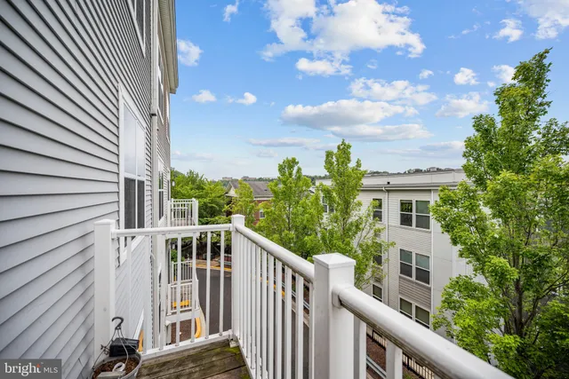 a view of a house with brick walls