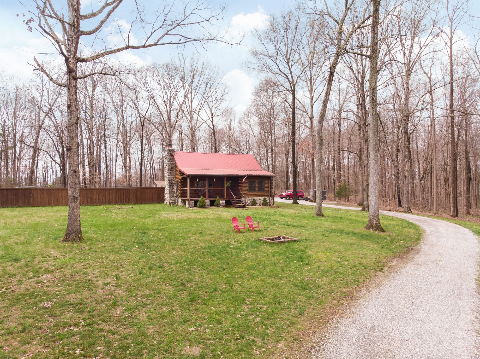 2342 Gideon Road Greenbrier, TN 37073 - Photo 7 of 38 a backyard of a house with toys and wooden fence
