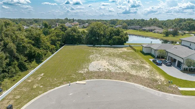 a view of a swimming pool with a lake view