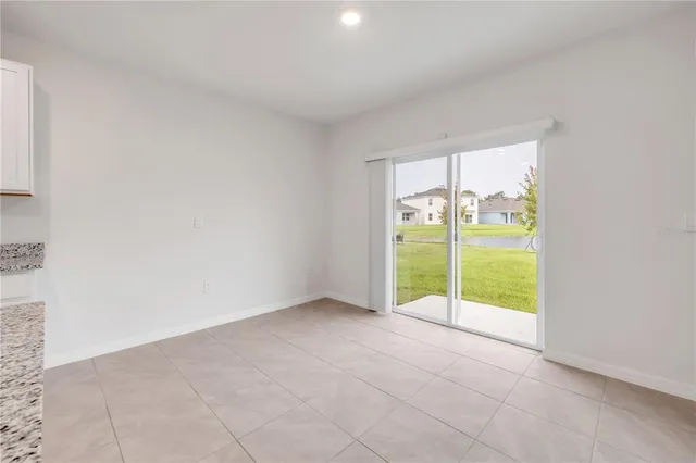 an empty room with natural light