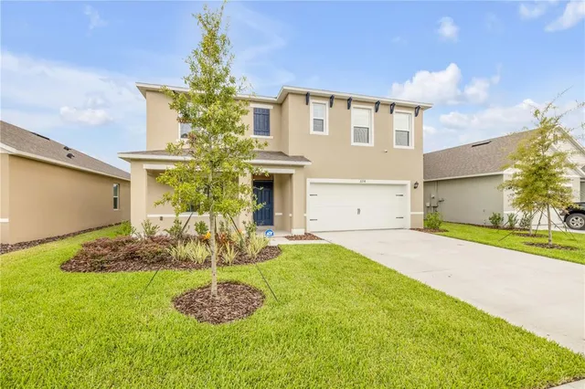 a front view of house with yard