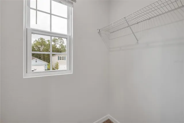 a view of a room with racks on the wall