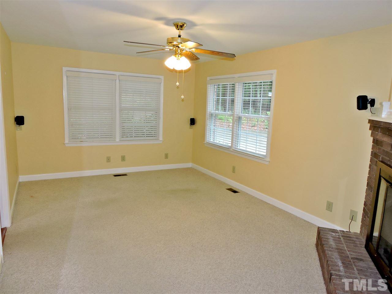 5930 Scalybark Road Durham, NC 27712 - Photo 22 of 25 a view of an empty room with a window