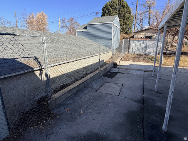 359 East 8400th Street South Sandy, UT 84070 - Photo 34 of 35 Back patio with new fence